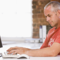 middle aged guy on computer
